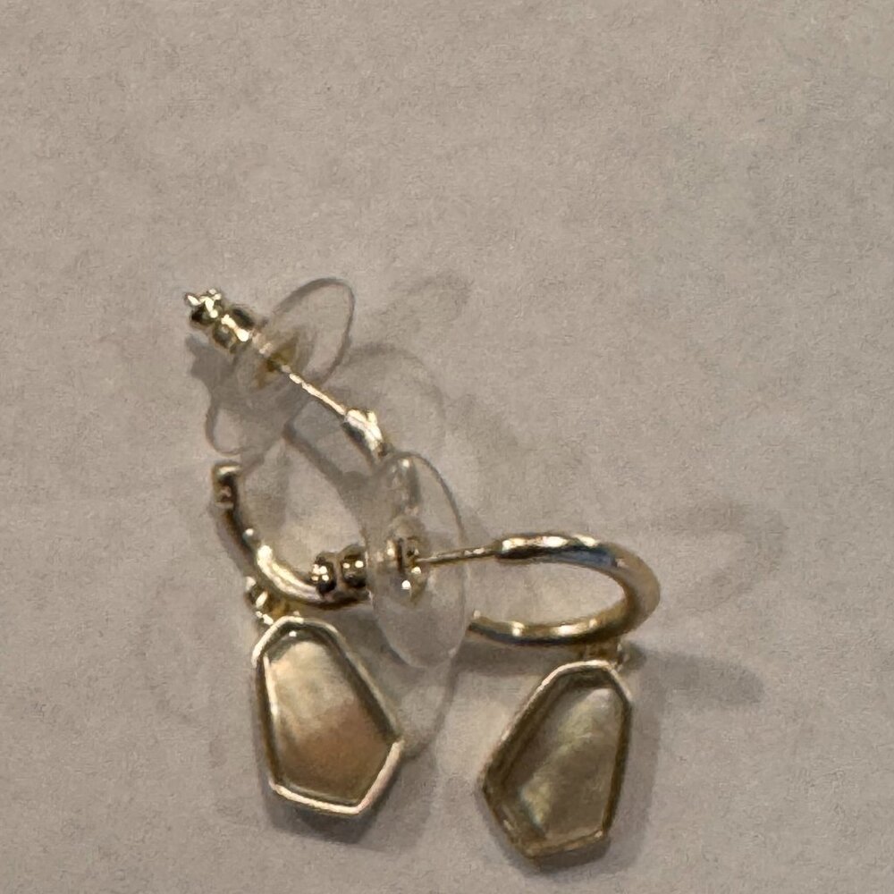 Kendra Scott silver tone hoop earrings with drop charm